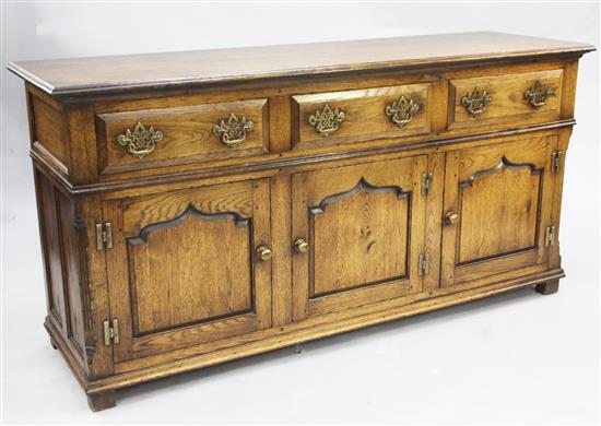 A George III style oak dresser base, W.5ft 6in.